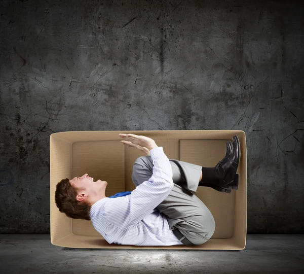 Man in box Stock Photo by ©SergeyNivens 55165583
