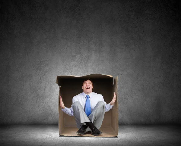 Man in box — Stock Photo, Image