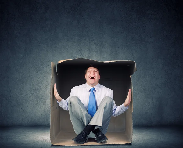 Man in box — Stock Photo, Image