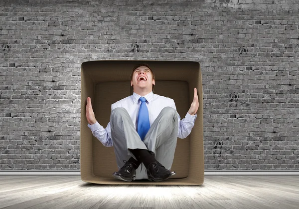 Man in box — Stock Photo, Image