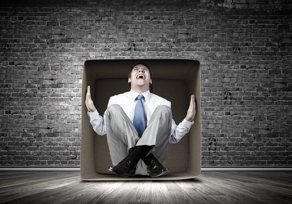 Man in box — Stock Photo, Image