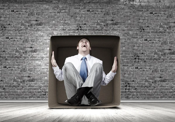 Man in box — Stock Photo, Image