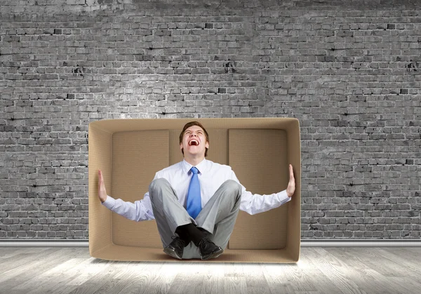 Man in box — Stock Photo, Image