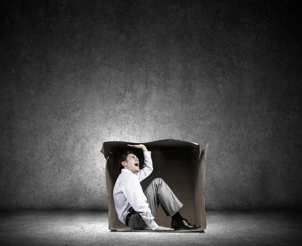 Man in box — Stock Photo, Image