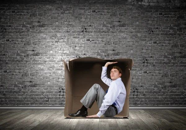 Man in box — Stock Photo, Image