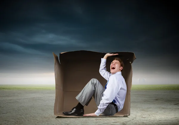 Man in box — Stock Photo, Image