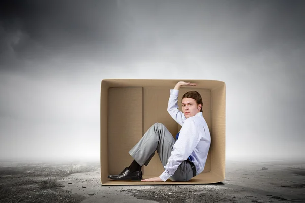 Man in box — Stock Photo, Image
