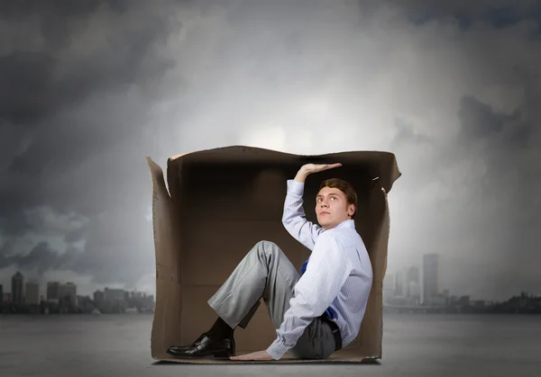 Man in box — Stock Photo, Image