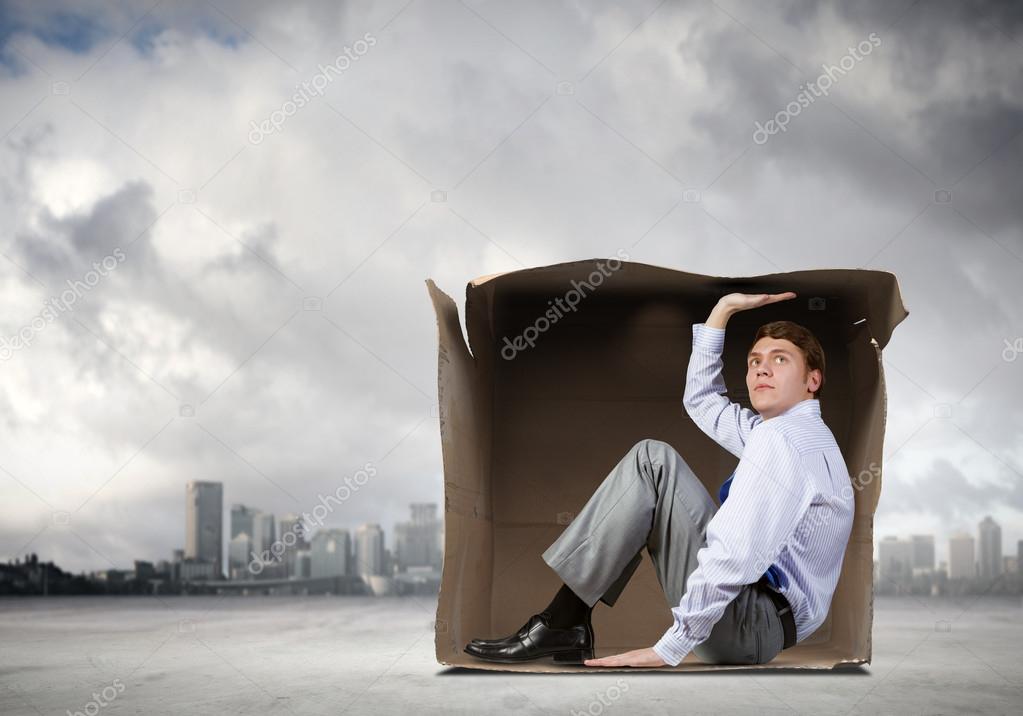 Man in box Stock Photo by ©SergeyNivens 55155323