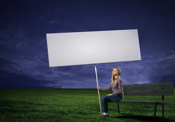 Woman with banner — Stock Photo, Image