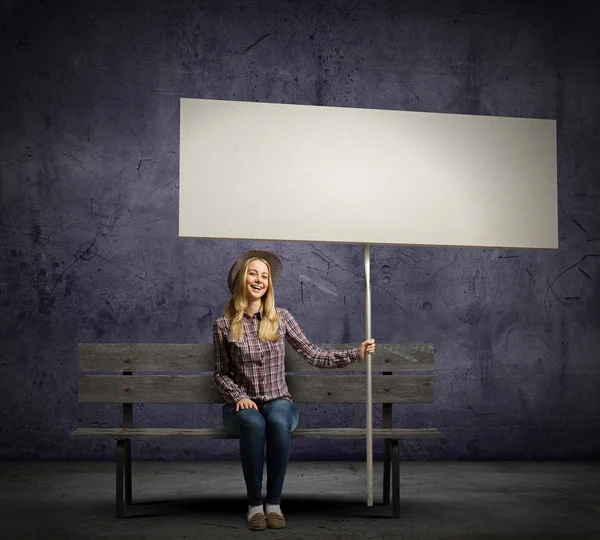 Woman with banner — Stock Photo, Image