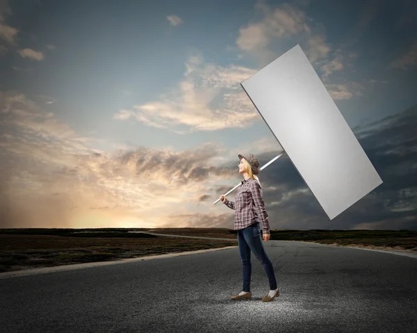 Woman with banner — Stock Photo, Image