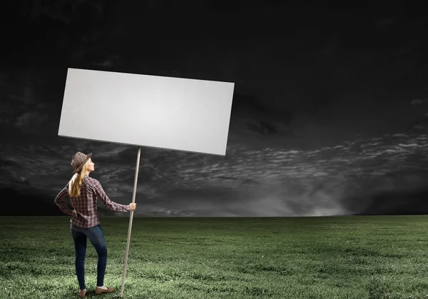 Woman with banner — Stock Photo, Image