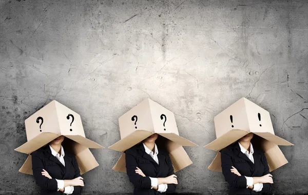 People with boxes on head — Stock Photo, Image