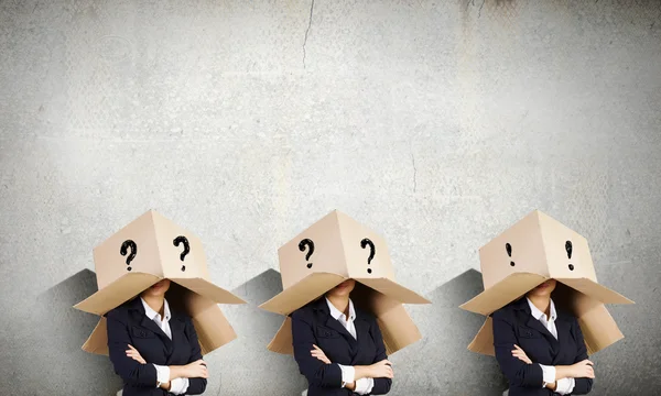 People with boxes on head — Stock Photo, Image