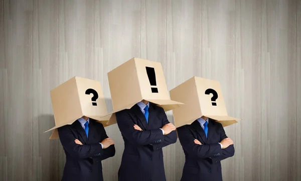 People with boxes on head — Stock Photo, Image