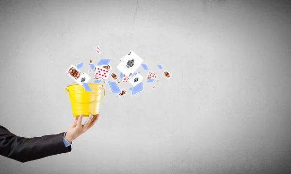 Businessman with bucket — Stock Photo, Image