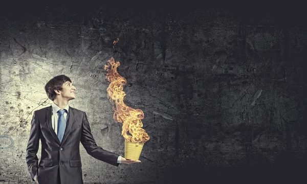 Businessman with bucket — Stock Photo, Image