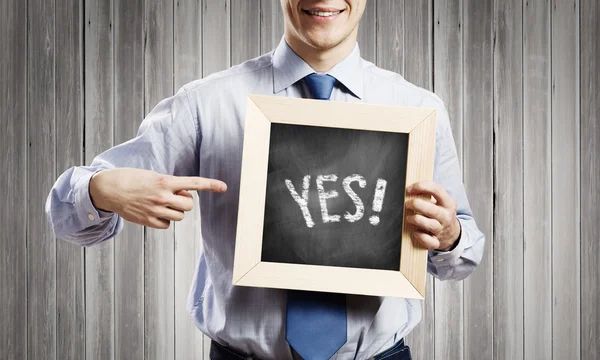 Businessman with frame — Stock Photo, Image