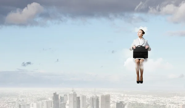Woman on cloud — Stock Photo, Image