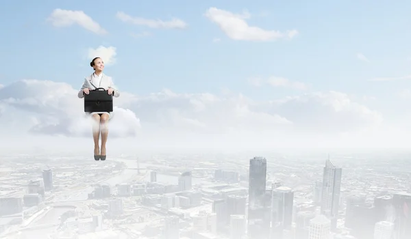 Woman on cloud — Stock Photo, Image