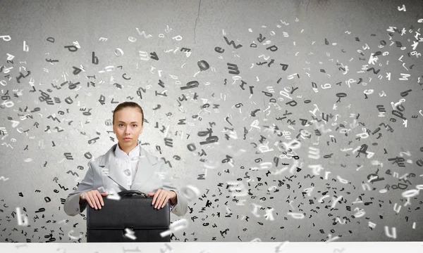 Businesswoman with suitcase — Stock Photo, Image