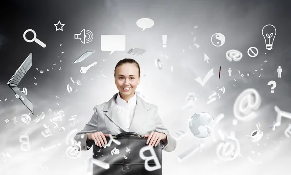 Businesswoman with suitcase — Stock Photo, Image