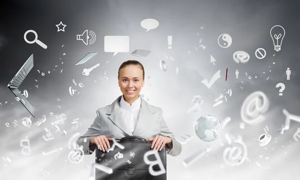 Businesswoman with suitcase — Stock Photo, Image