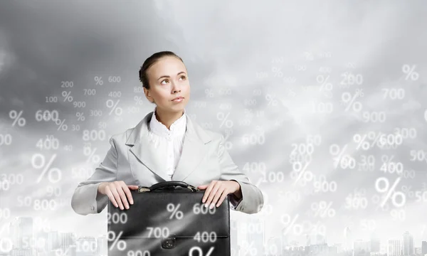 Businesswoman with suitcase — Stock Photo, Image