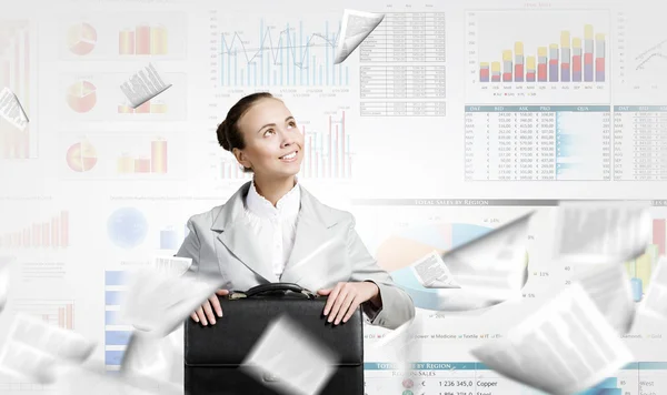 Businesswoman with suitcase — Stock Photo, Image