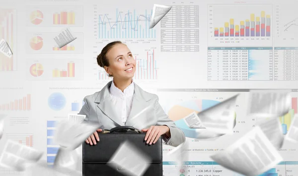 Businesswoman with suitcase — Stock Photo, Image