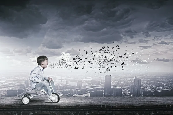 Boy riding bicycle — Stock Photo, Image