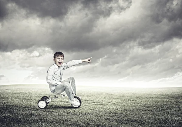 Boy riding bicycle — Stock Photo, Image