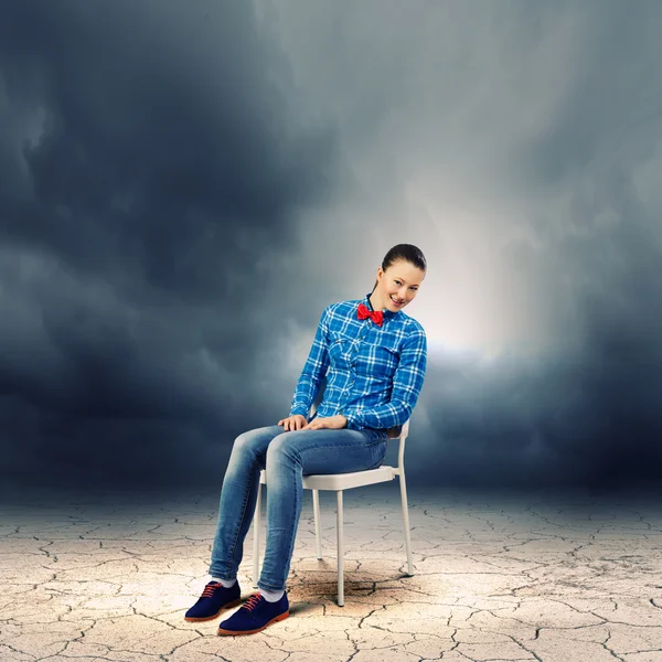 Woman in chair — Stock Photo, Image