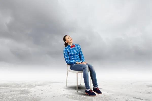 Woman in chair — Stock Photo, Image