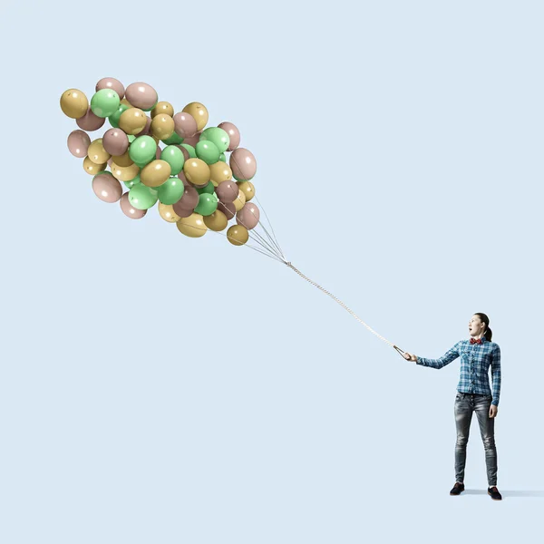 Kvinna med ballonger — Stockfoto