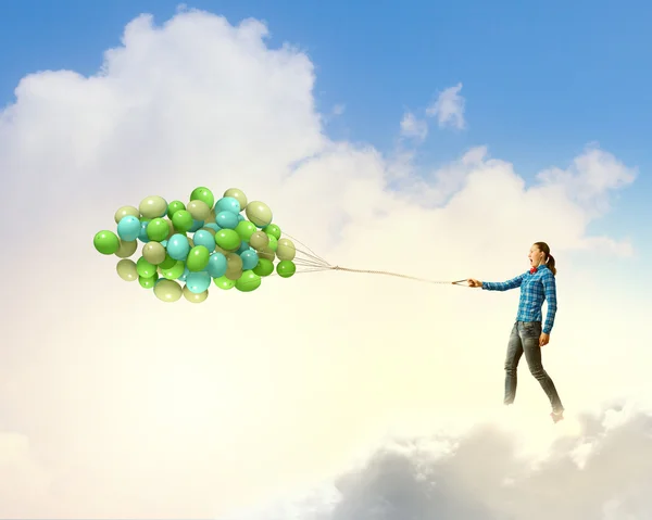 Woman with balloons — Stock Photo, Image