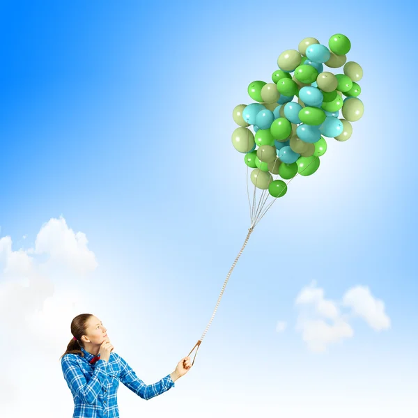 Woman with balloons — Stock Photo, Image