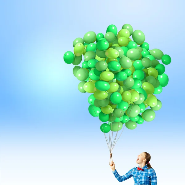 Woman with balloons — Stock Photo, Image