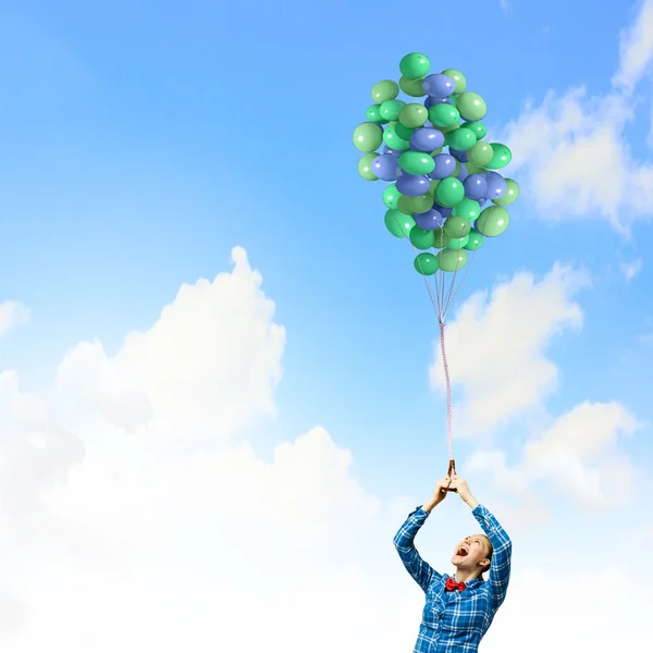 Woman with balloons — Stock Photo, Image