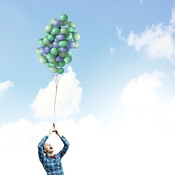 Vrouw met ballonnen — Stockfoto