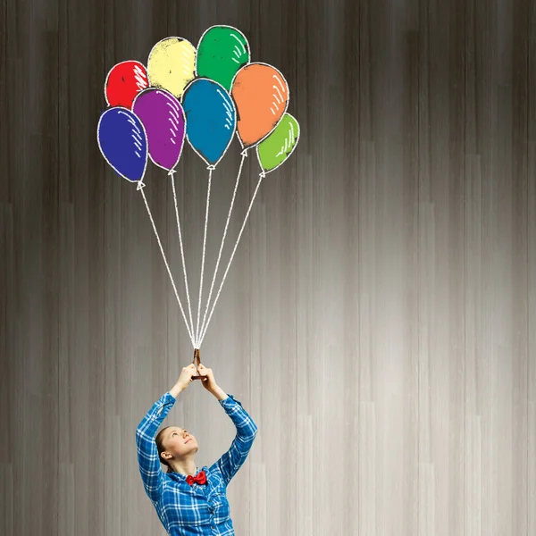 Femme avec des ballons — Photo