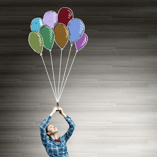 Woman with balloons — Stock Photo, Image