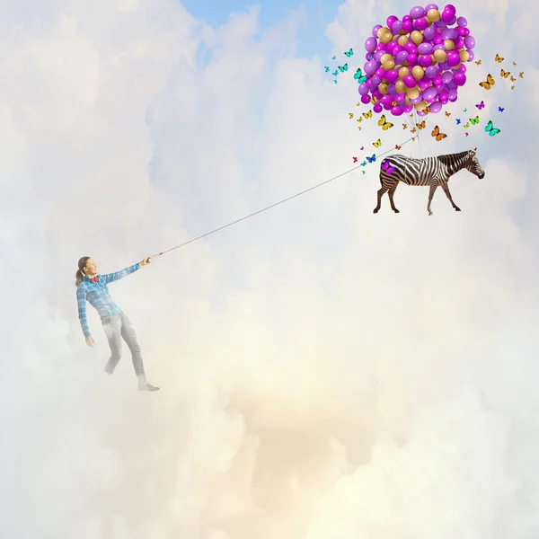 Woman with balloons — Stock Photo, Image