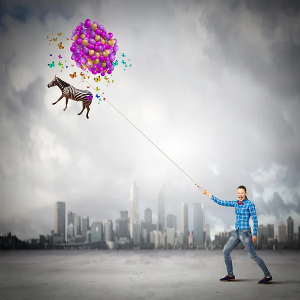 Vrouw met ballonnen — Stockfoto