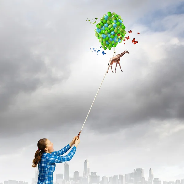 Woman with balloons — Stock Photo, Image