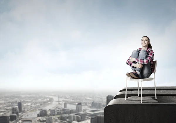 Woman in chair — Stock Photo, Image