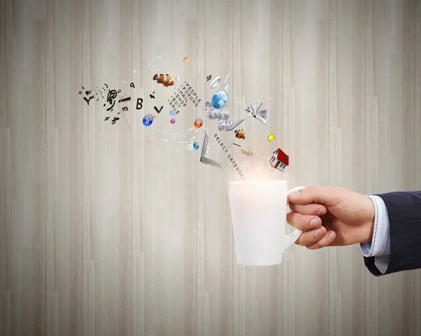 Cup in hand — Stock Photo, Image