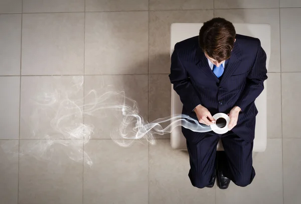 Businessman on chair — Stock Photo, Image