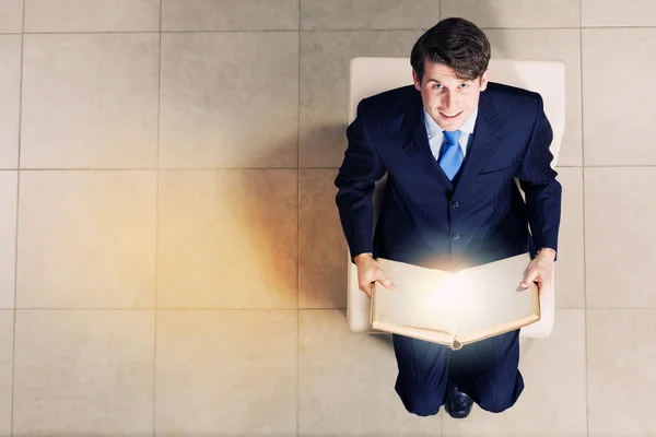 Businessman on chair — Stock Photo, Image